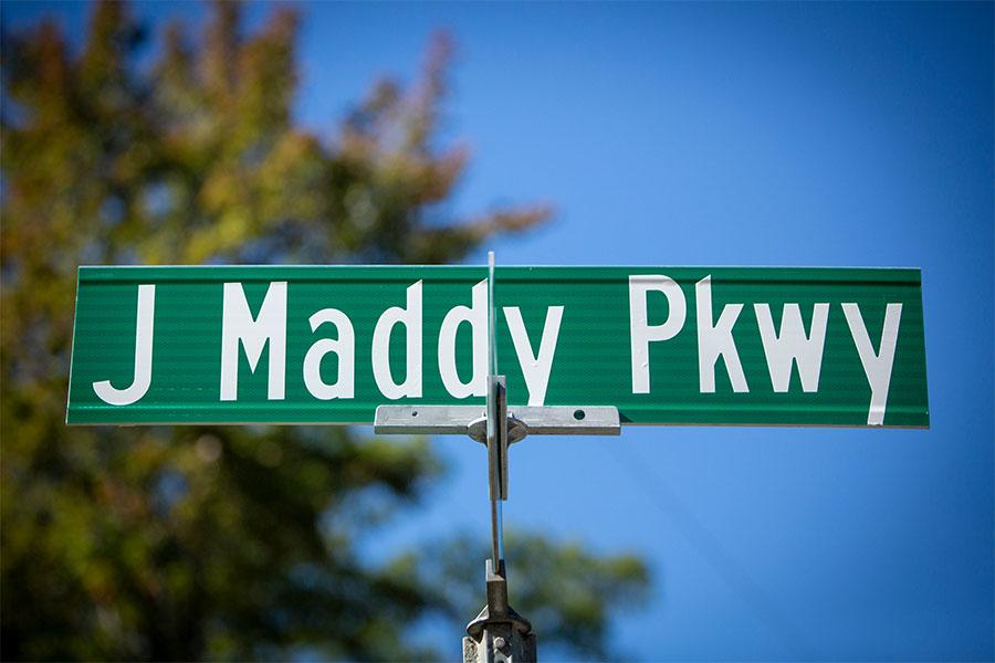 A street sign for the recently renamed J. Maddy Parkway
