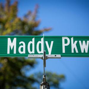 A street sign for the recently renamed J. Maddy Parkway