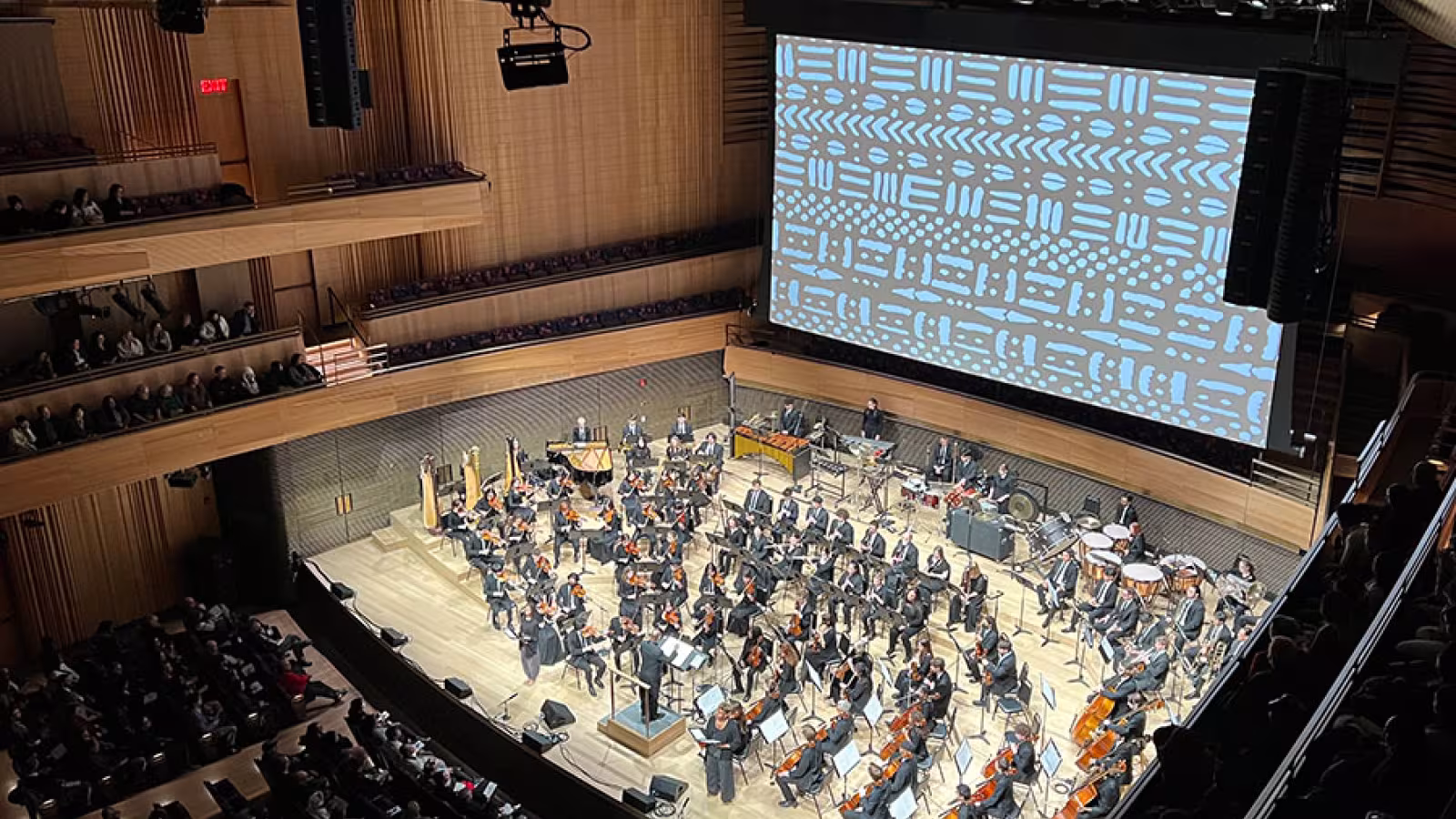 The Interlochen Arts Academy Orchestra performs MUKTI at David Geffen Hall. 
