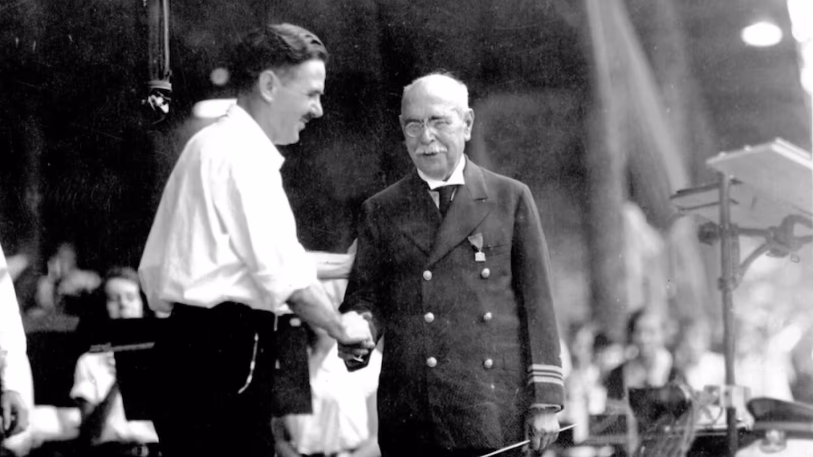 Joseph E. Maddy shales hands with  John Philip Sousa