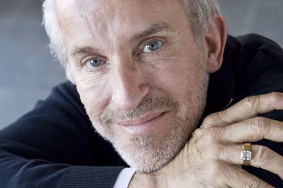 A smiling middle-aged man