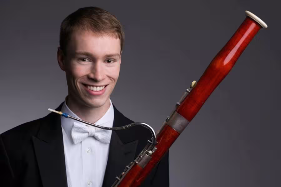 A man with a bassoon