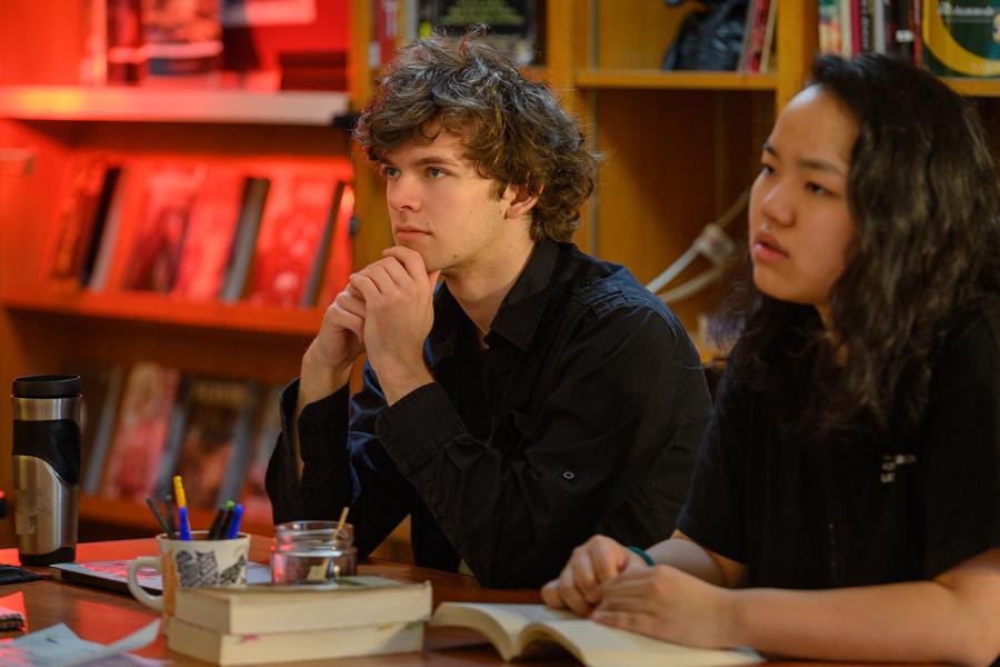Two students listen intently during an academic class at Interlochen Arts Academy