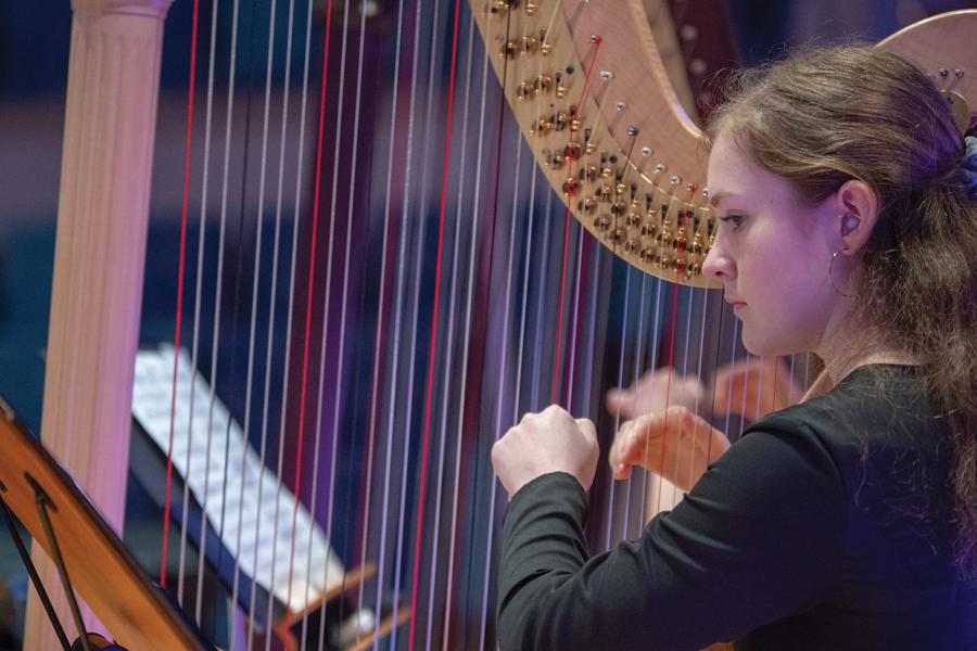A girl playing the harp