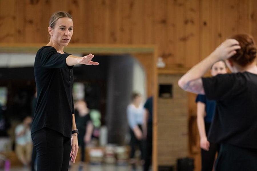 Katie Dorn (right) works with a dance student during a recent class.