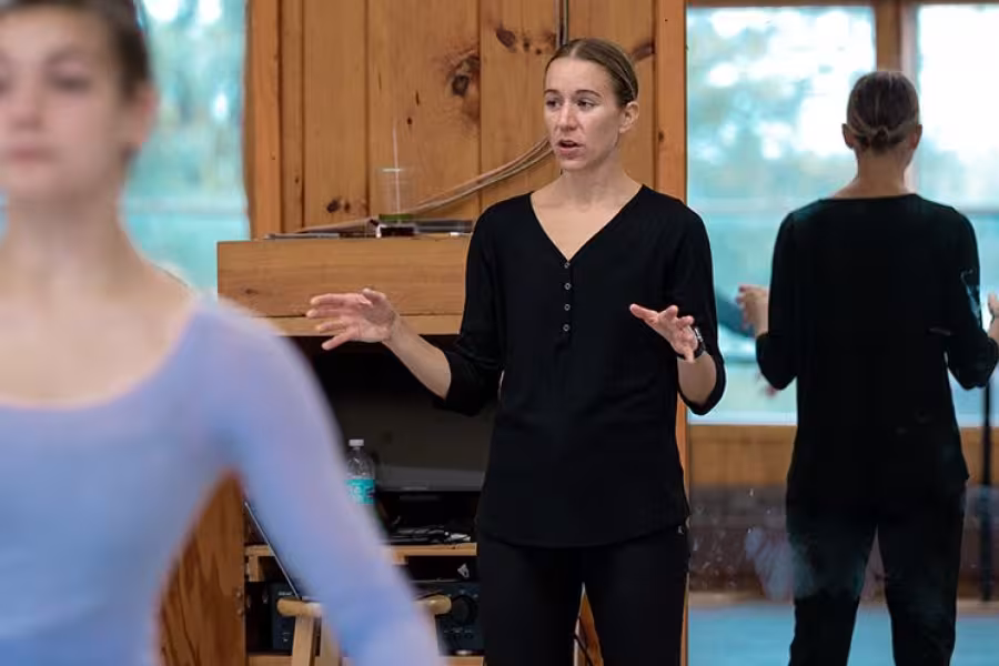 Dorn explains a technique during a contemporary dance class.