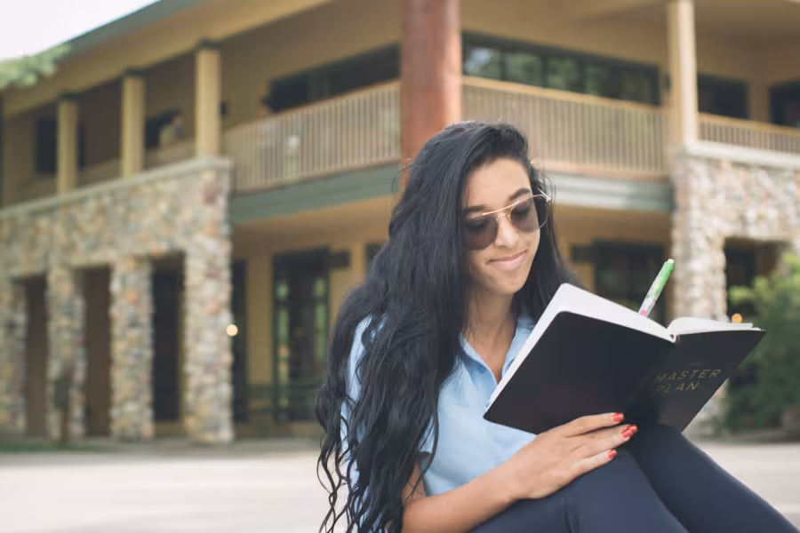 Camp creative writing student outside The Writing House