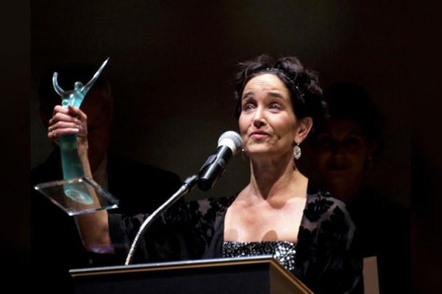 Cate Caplin receiving the 2011 Ovation Award for Excellence in Choreography.