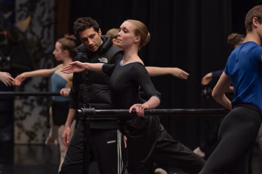 Interlochen Arts Academy dance instructor teaches student at the barre