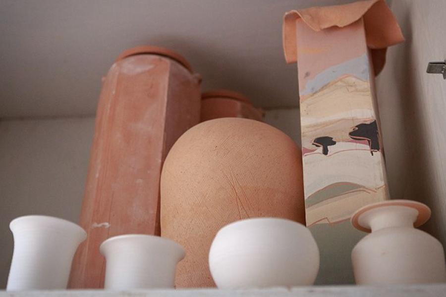 Several of the unglazed pieces in Parsons' studio.