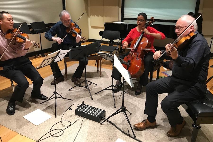 A string quartet plays inside IPR's Studio A