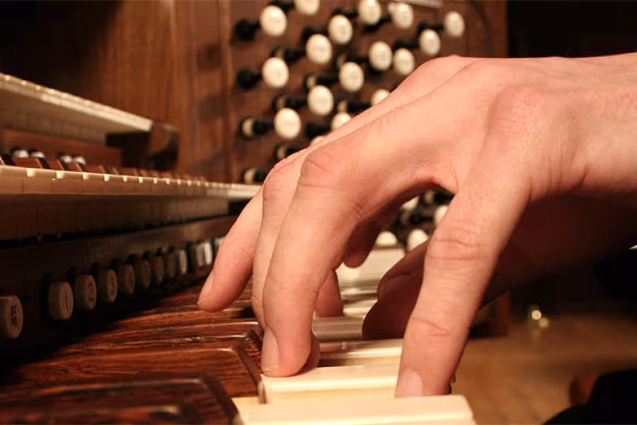 Student plays the organ