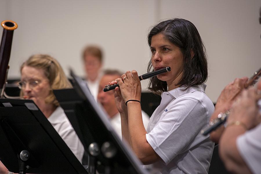 Photo of woman playing flute at band camp