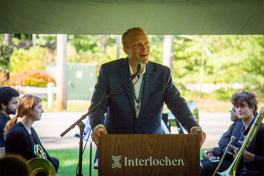 President Trey Devey speaks at the J Maddy Parkway dedication