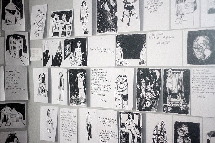 A collection of small, black-and-white sketches with written words adorn the walls of Oaklee Thiele's studio.