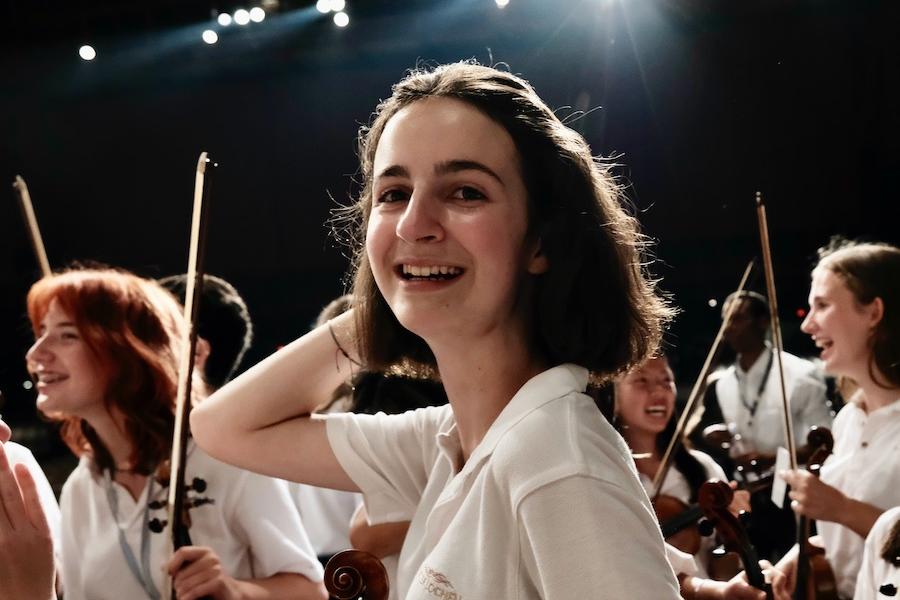 Interlochen Arts Camp student smiles after Les Preludes concludes