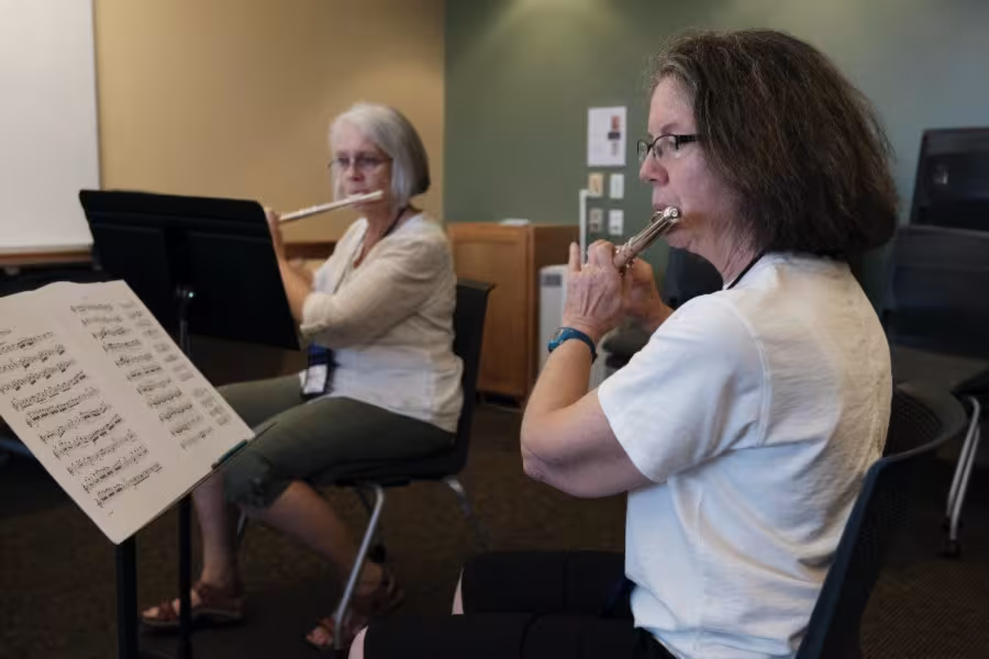 Flute faculty members practicing