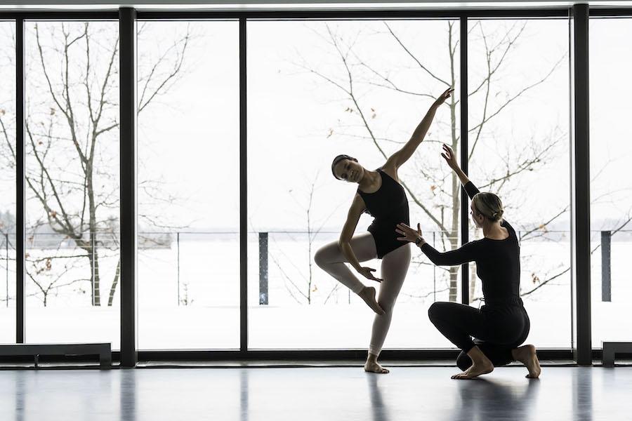 Katie Dorn instructs female contemporary dance student