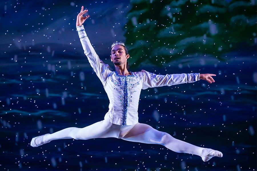 A dancer leaps through the air during the 2021 performance of "The Nutcracker"
