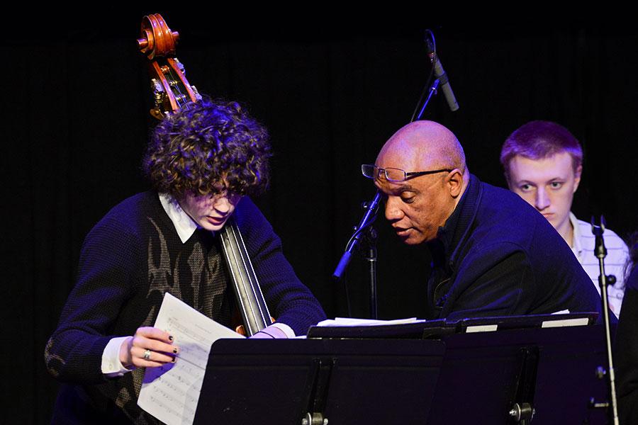 Billy Childs works with an Arts Academy bass student