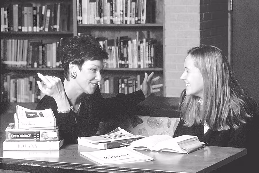 Jean Gaede works with a student in 1993.