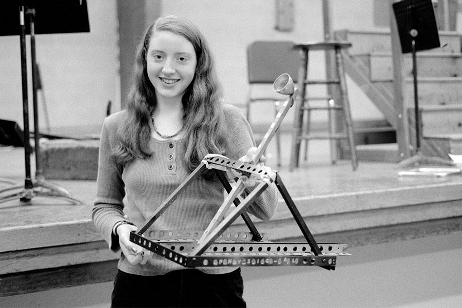 Zerrin Veldman-Preble poses with her prize-winning catapult during the 1996-97 academic year. 