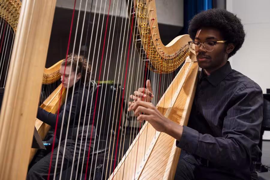 Interlochen Arts Academy harp student performs in orchestra