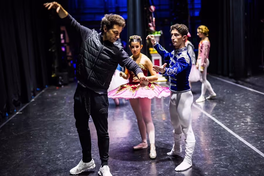 Joseph teaching dancers.