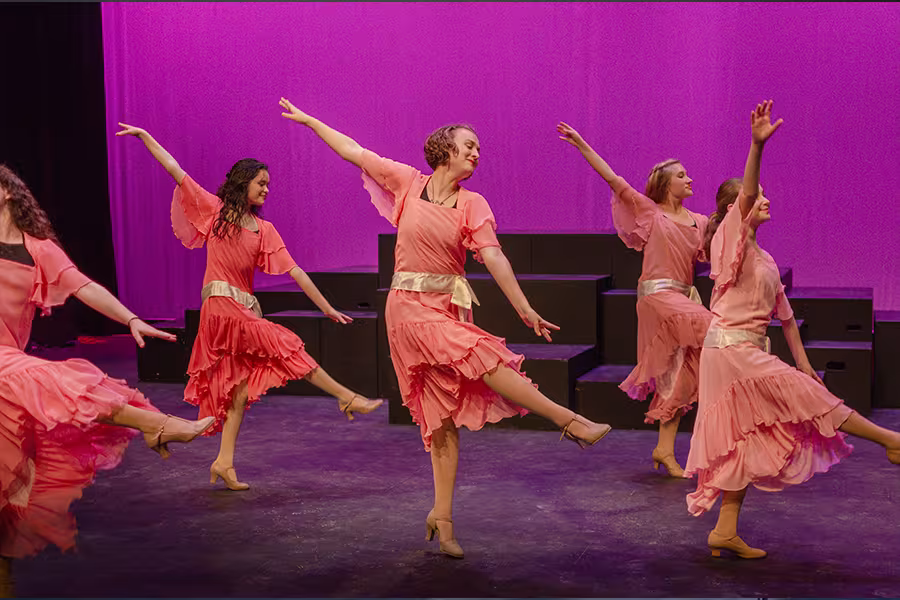 camp students dancing dramatically on stage