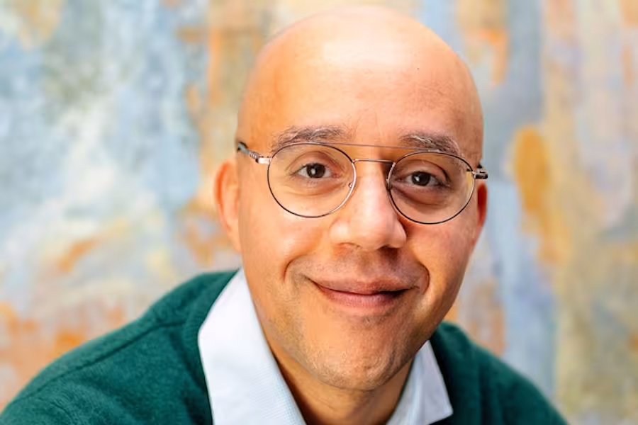 Headshot of Michael Romy Greer