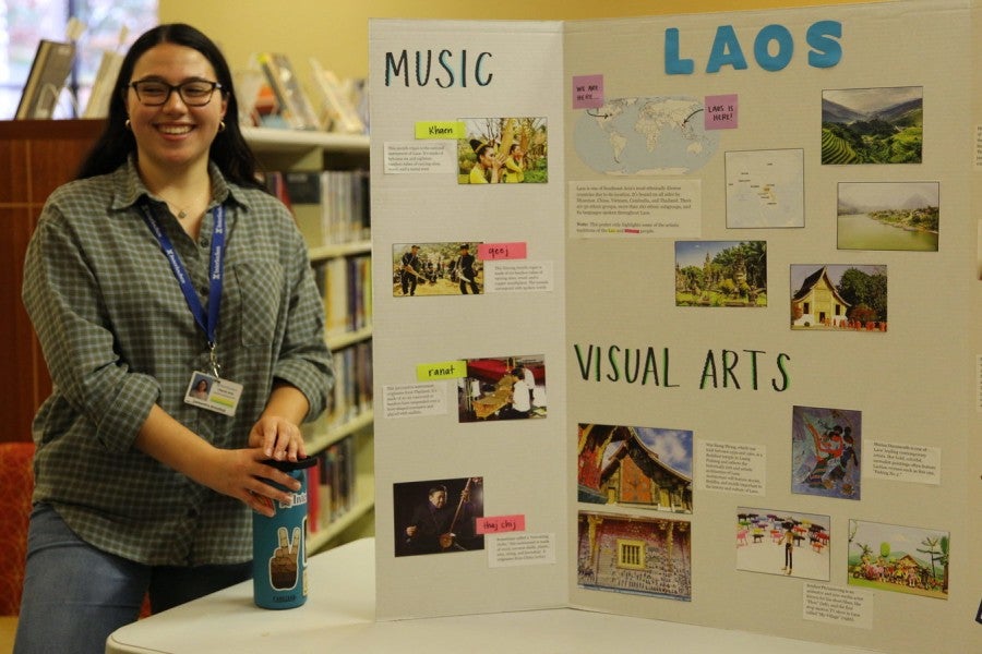 An Interlochen Arts Academy faculty member discusses Laos at the annual Culture Fair