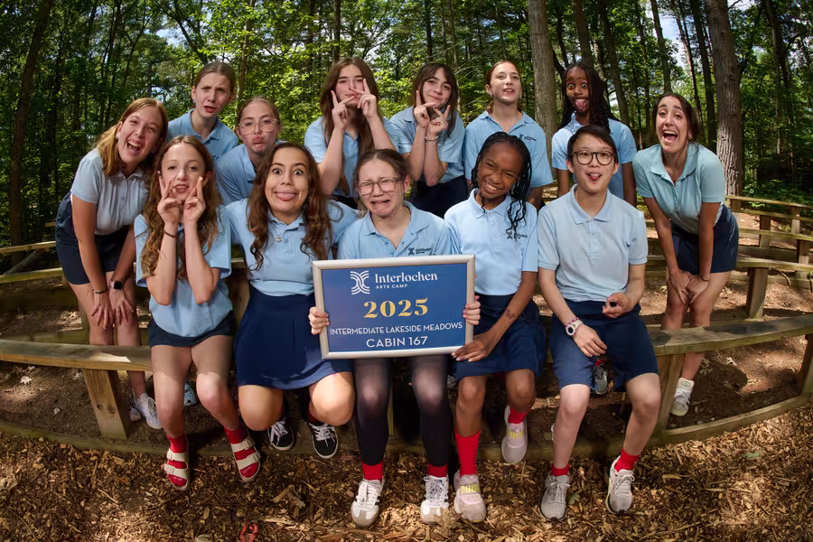 Students make silly faces for their cabin group picture.