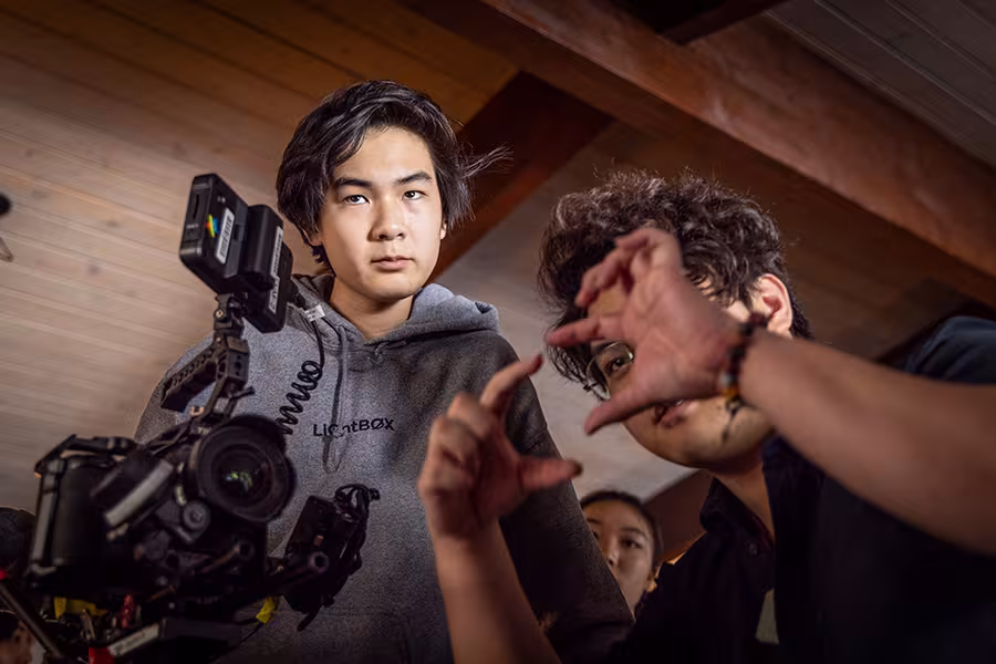 Two Interlochen Arts Academy students on a film set