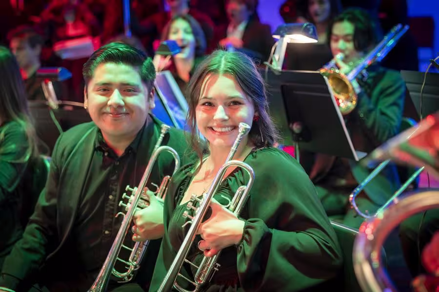 Two students smile during Sounds of the Season