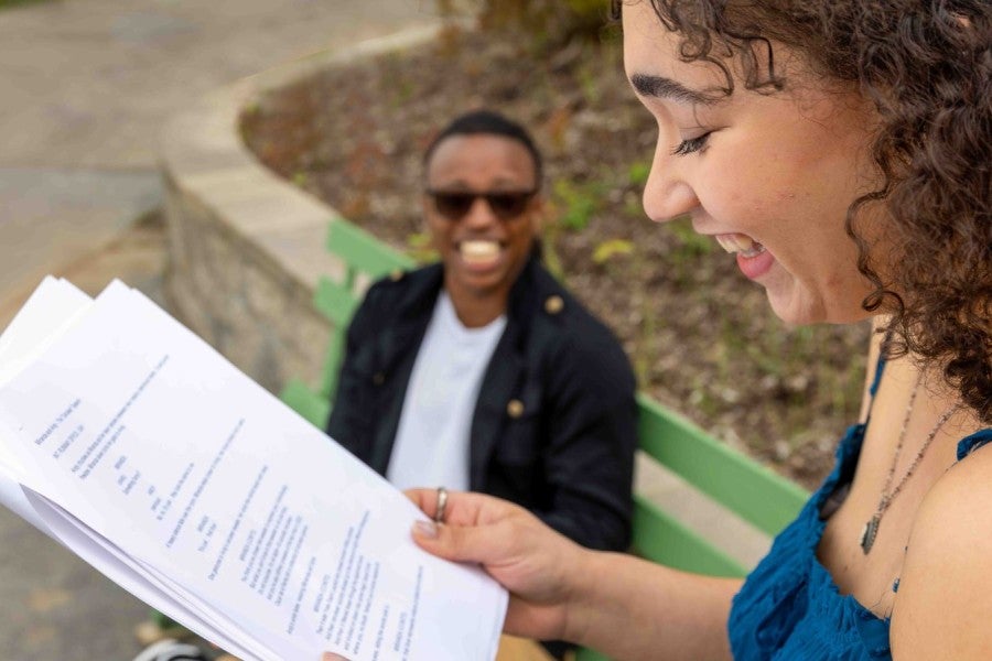A girl reading a script