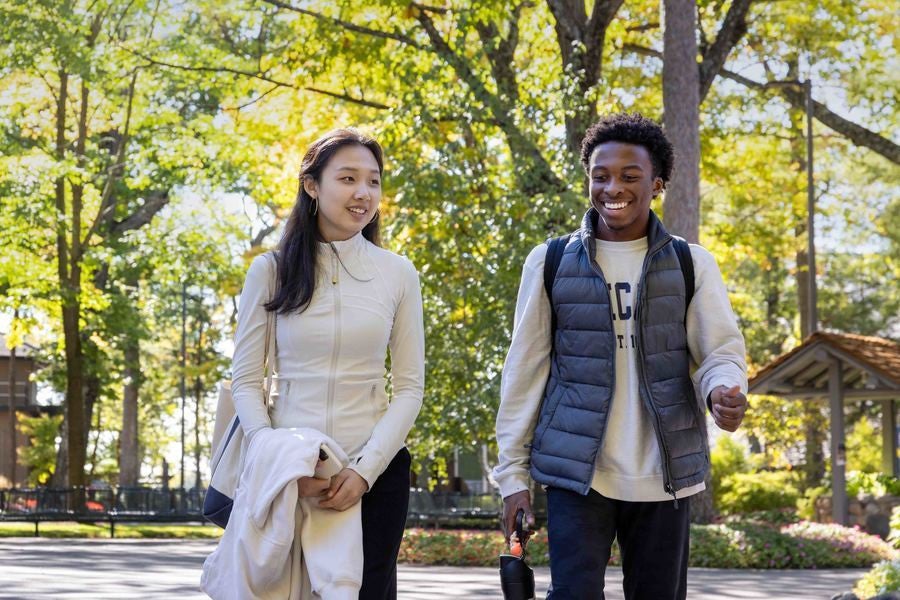 Two Interlochen Arts Academy students walk to class