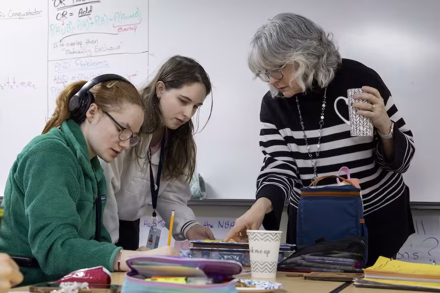 Interlochen Arts Academy students work with their AP statistics instructor