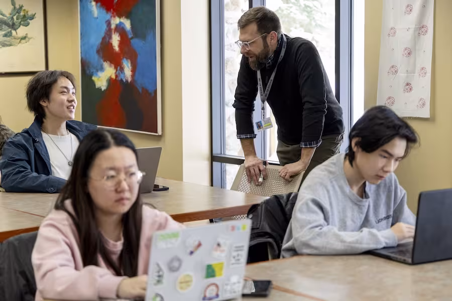 Interlochen Arts Academy students speak with their history instructor