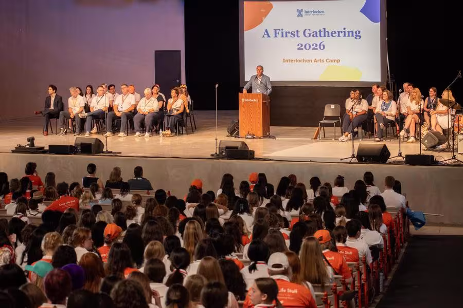 Interlochen President Trey Devey addresses the audience at First Gathering