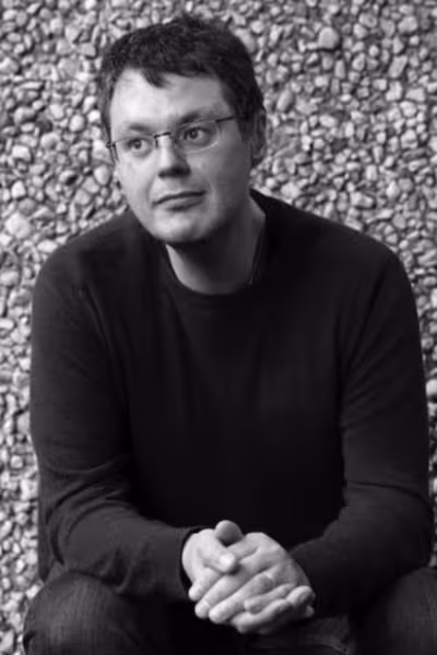 Professional headshot of Ilya Kaminsky