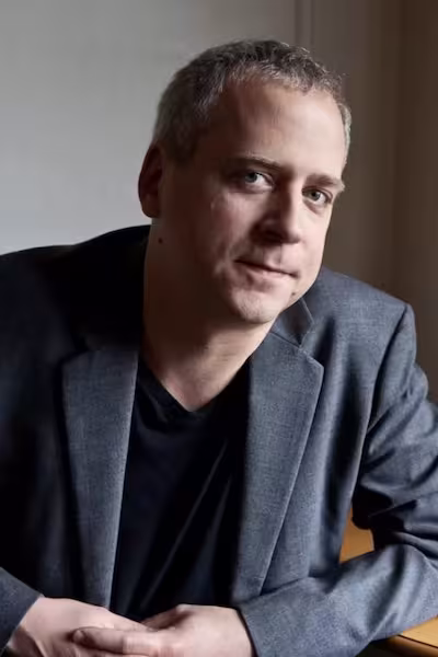 Professional headshot of Jeremy Denk