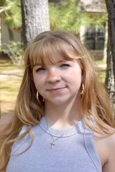 IAA student smiles for the camera