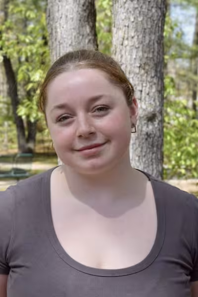 IAA student smiles for the camera