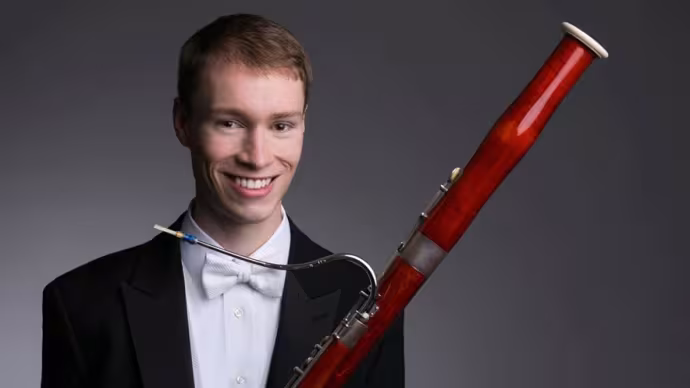 A man with a bassoon