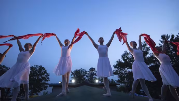 Dancers on the roof of the Interlochen Bowl