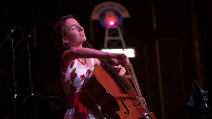 A girl plays the cello on the NPR program From the Top