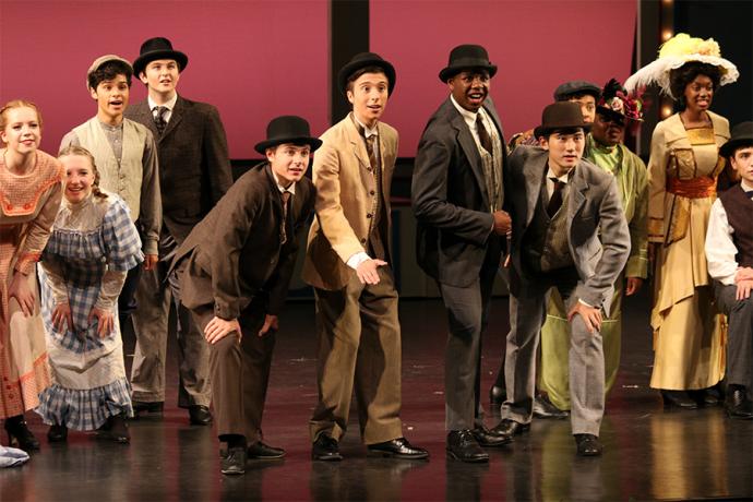 A group of students in "The Music Man"