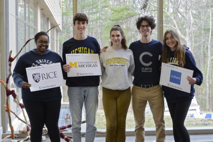 Class of 2022 students post with college acceptances