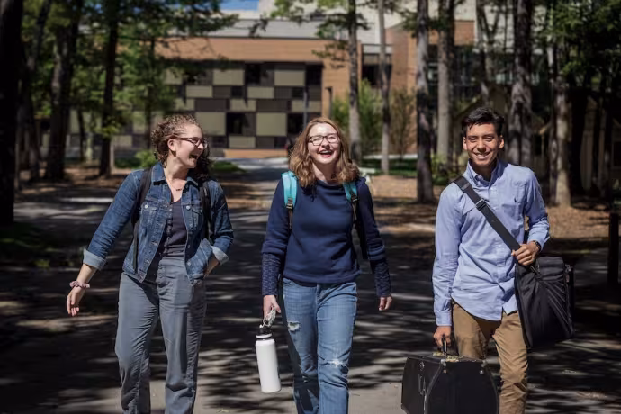 Three students walking (Who can afford arts boarding school)