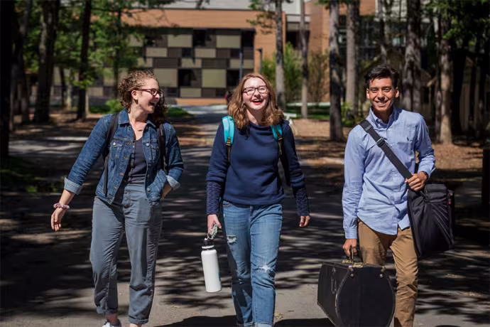 Three Interlochen Arts Academy students walk to their next class.